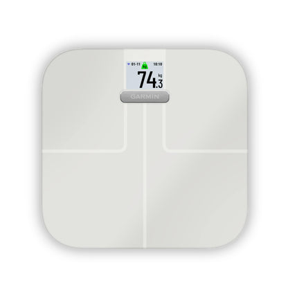 White Garmin Index S2 smart scale with digital display showing 74.3 kg