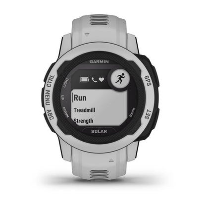 Garmin Instinct 2S Solar smartwatch displaying workout options including Run, Treadmill, and Strength.