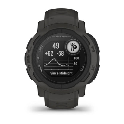 A Garmin smartwatch displaying fitness metrics, including heart rate (49 bpm), calories burned (+62), and steps taken (-58) since midnight, with a graphical representation of activity levels. The watch features a rugged design with a dark green strap.