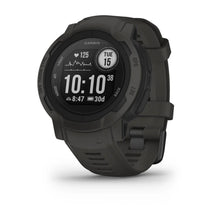 Garmin smartwatch displaying heart rate, time, and date, with a rugged design and dark green strap.