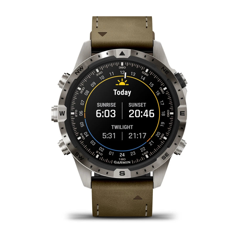 Garmin MARQ Adventurer (Gen 2) smartwatch displaying sunrise and sunset times with a brown leather strap.