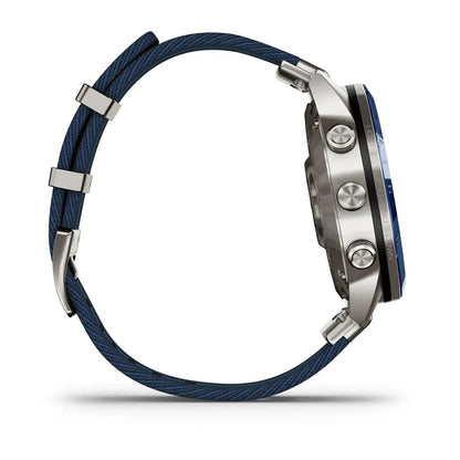 Garmin MARQ Captain Gen 2 – flat lay of watch and strap on white background