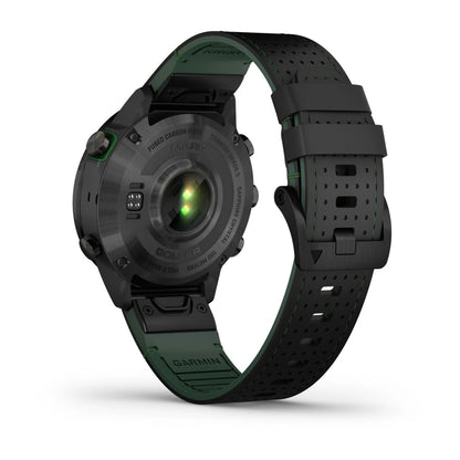 Garmin MARQ Golfer (Gen 2) Carbon Edition smartwatch showing the back view, featuring a black and green design with a sapphire lens and heart rate sensor.