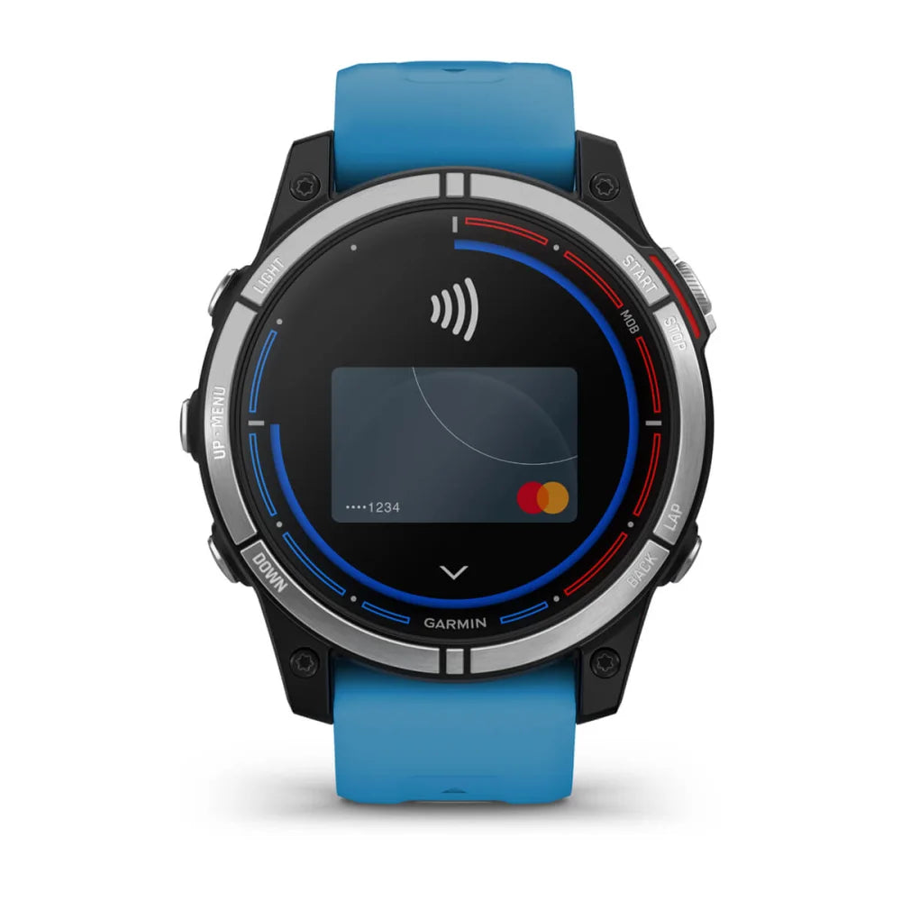 Garmin quatix 7 Standard Edition smartwatch with a blue strap, featuring a digital display showing a contactless payment icon and a Mastercard logo.