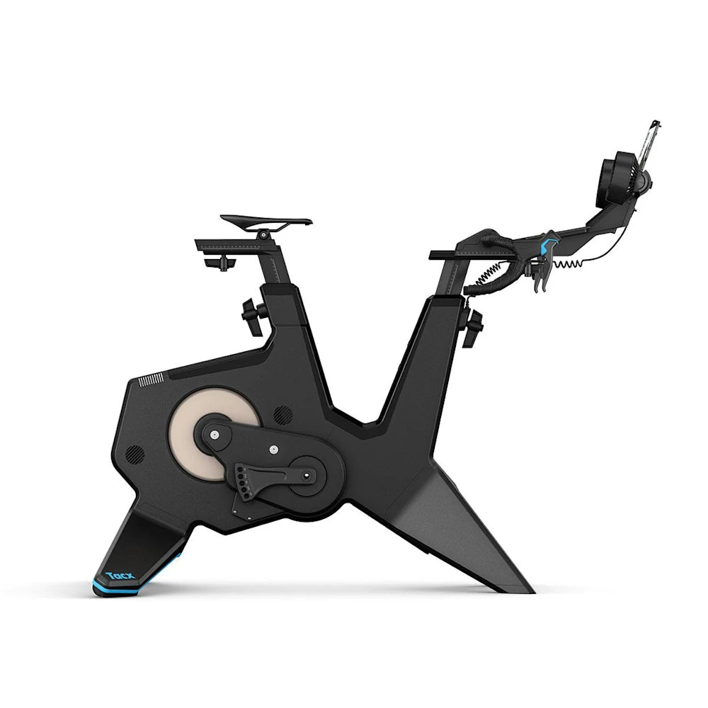 Tacx NEO Bike Plus smart trainer, sleek black design with adjustable seat and handlebars.