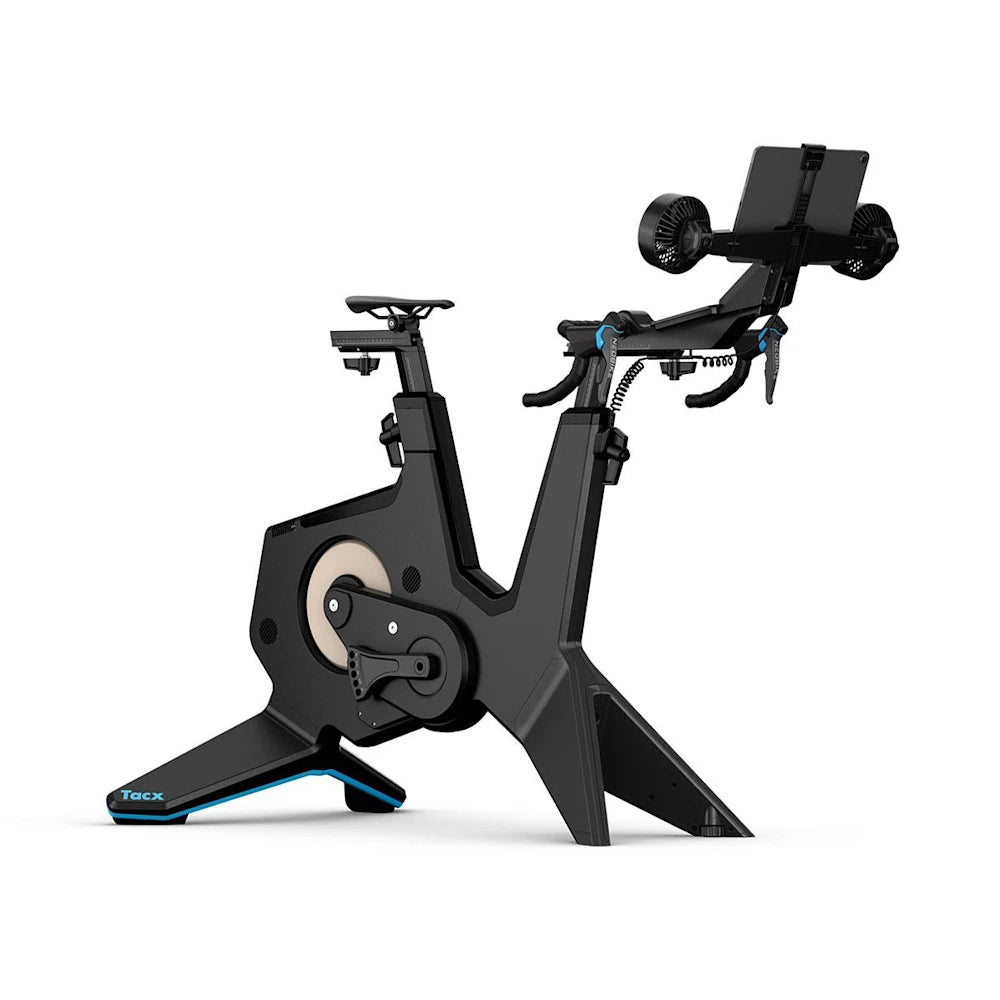 Tacx Neo Bike Smart indoor trainer with tablet holder for immersive cycling workouts.