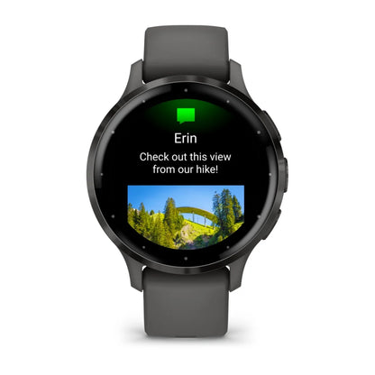 Garmin Venu 3S smartwatch displaying a message from Erin with a photo of a scenic view from a hike.