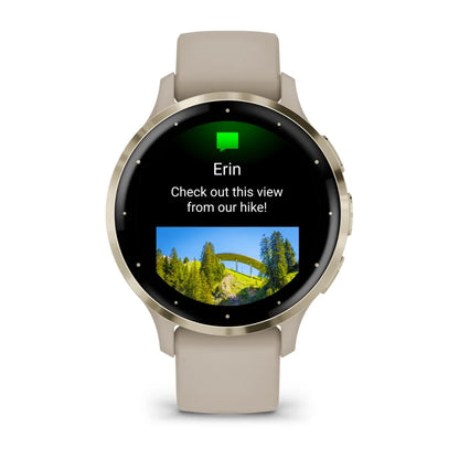 Garmin Venu 3S smartwatch displaying a message from Erin with a photo of a scenic view from a hike.