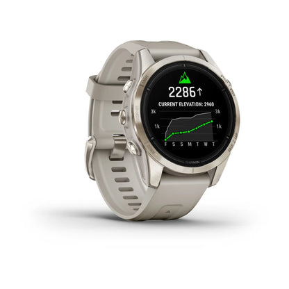 Garmin epix Pro (Gen 2) Sapphire Edition smartwatch displaying elevation data with a green graph on a black screen, set on a light-colored strap.