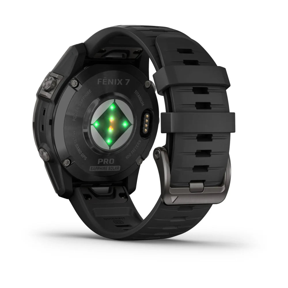 Garmin Fenix 7 Pro Sapphire Solar Edition smartwatch displaying its back with green sensors illuminated.