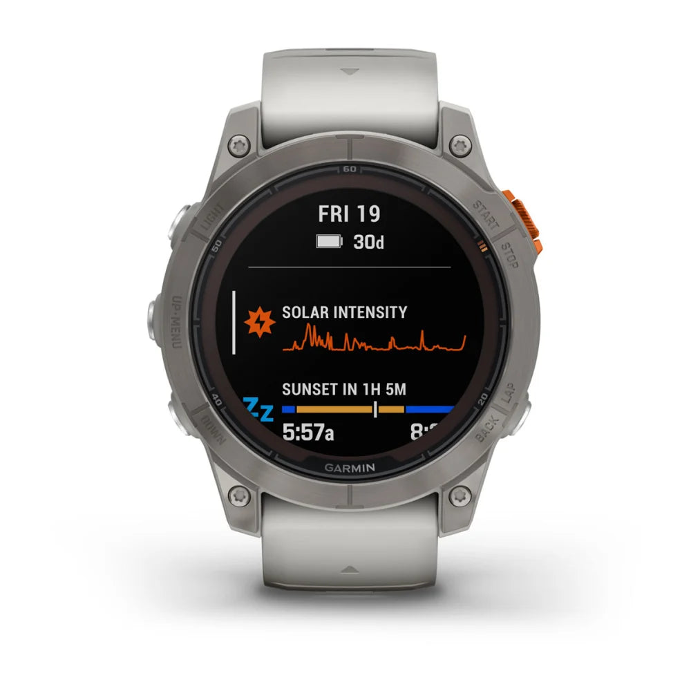 Garmin Fenix 7 Pro Sapphire Solar Edition smartwatch displaying solar intensity and sunset time on its screen.