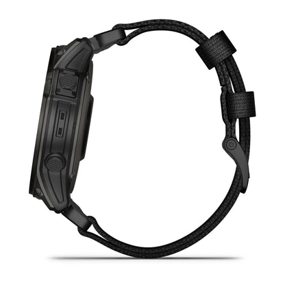 Side view of the Garmin tactix 7 AMOLED Edition smartwatch, featuring a black design and textured strap.