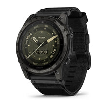 Garmin tactix 7 AMOLED Edition smartwatch displayed at an angle, featuring a black strap and a digital watch face showing the time and various metrics.