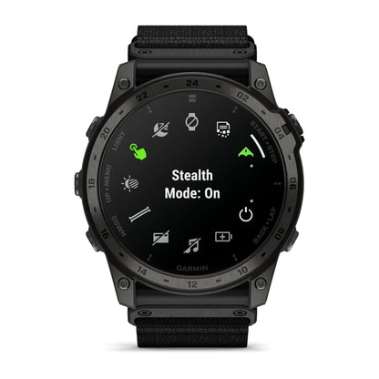 Garmin tactix 7 AMOLED Edition smartwatch displaying 'Stealth Mode: On' on its screen with various icons in a black interface.
