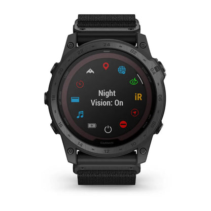 Garmin tactix 7 Pro Edition smartwatch displaying the 'Night Vision: On' feature with various icons on the screen.