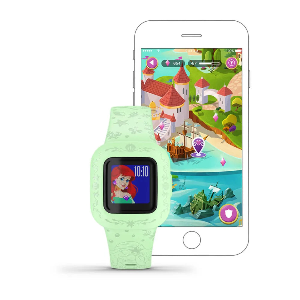 Garmin vívofit jr. 3 smartwatch with a green design featuring a character on the screen, alongside a smartphone displaying a colorful game interface.