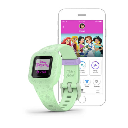 Garmin vivofit jr. 3 smartwatch in mint green with Disney Princess design, displayed next to a smartphone showing the app interface.