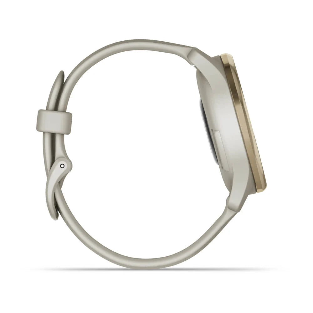 Side view of the Garmin vivomove Trend smartwatch featuring a light-colored strap and a gold-toned bezel.