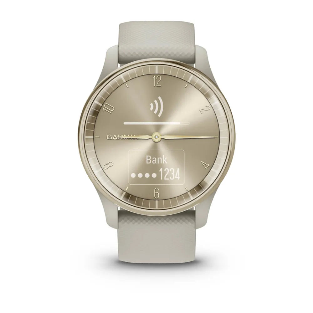 Garmin vivomove Trend smartwatch displaying a gold watch face with a payment option and a light-colored strap.