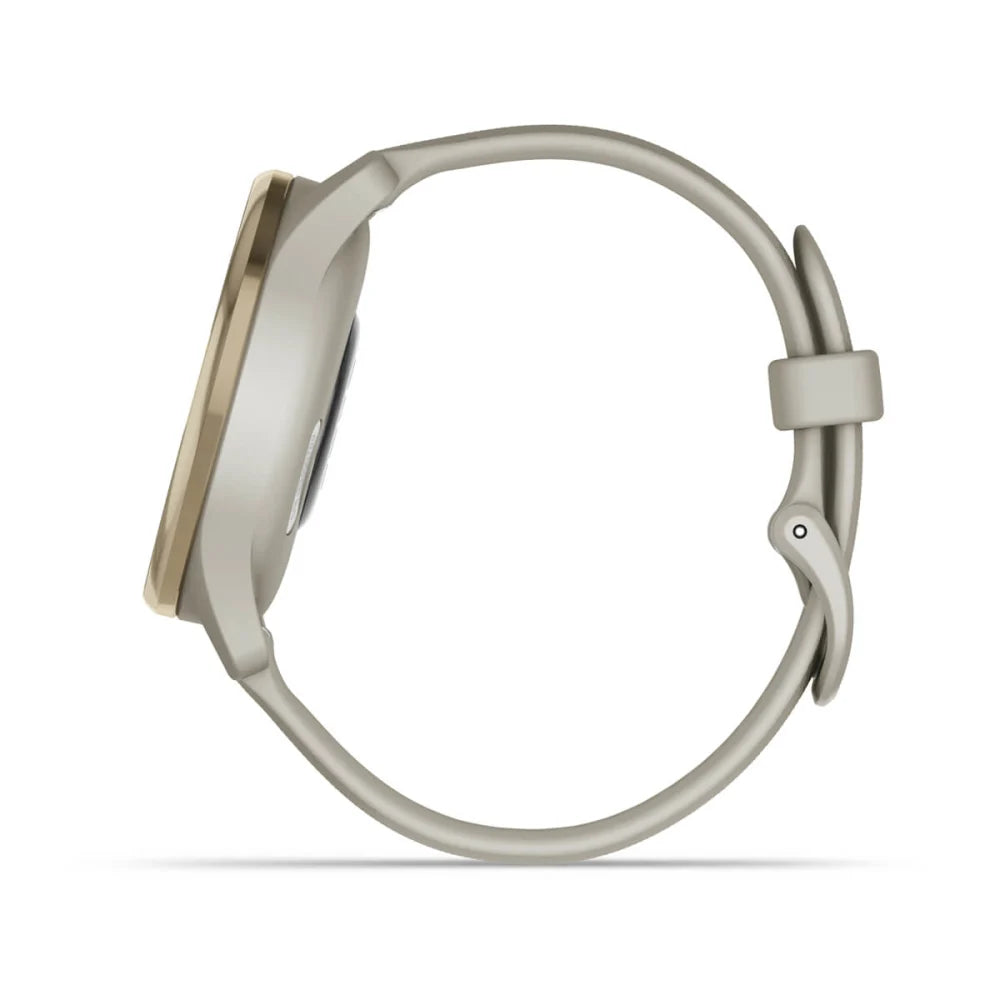Side view of the Garmin vivomove Trend smartwatch featuring a sleek design with a gold bezel and a light gray strap.