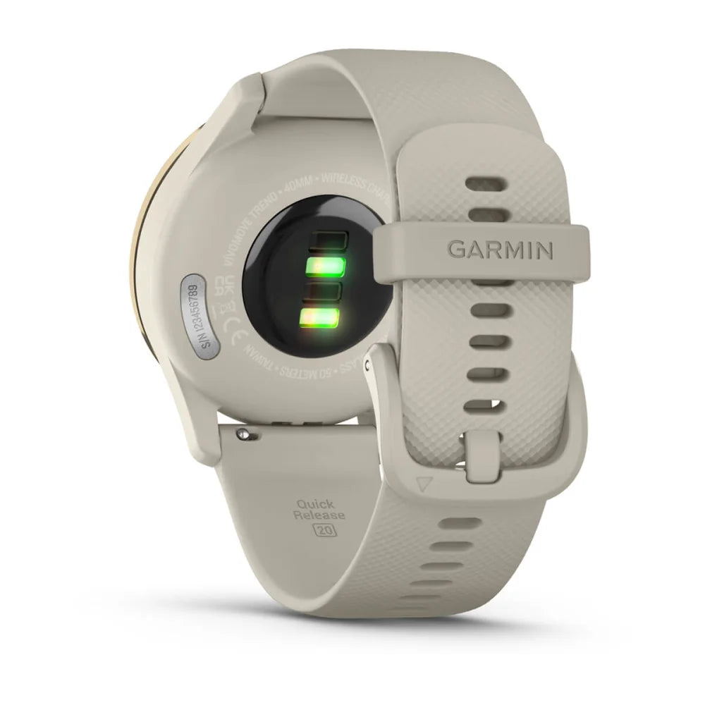 Back view of a Garmin vivomove Trend smartwatch showing its green heart rate sensors and a light beige silicone strap.