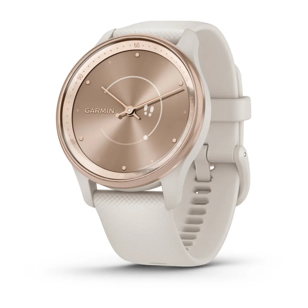 Garmin vivomove Trend smartwatch with a rose gold dial and a light beige strap, featuring minimalist design elements.