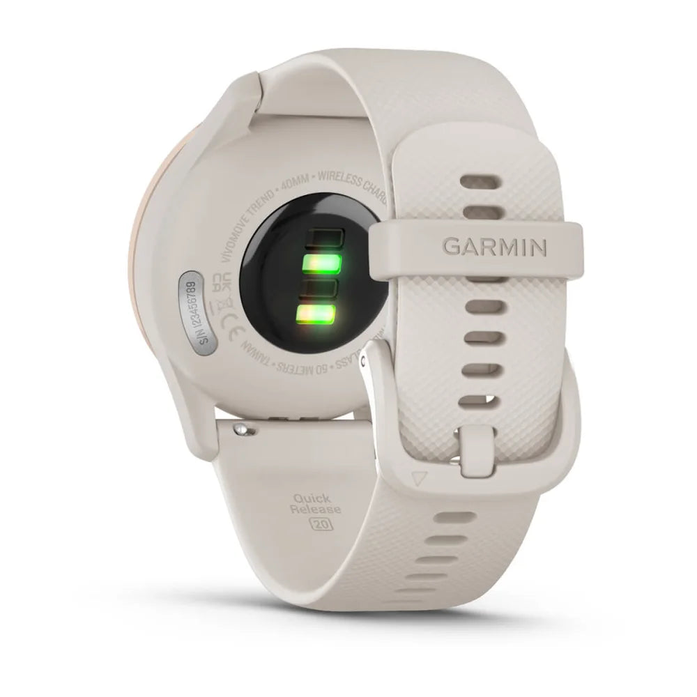 Back view of the Garmin vivomove Trend smartwatch showing the heart rate sensors and a light beige strap.