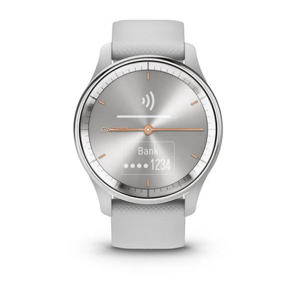 Garmin vivomove Trend smartwatch with a silver dial and white strap, displaying a contactless payment symbol and banking information.