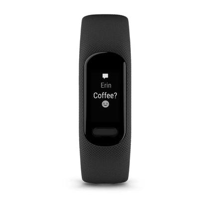 Garmin vivosmart 5 fitness tracker displaying a message that says 'Erin? Coffee?' on its screen.