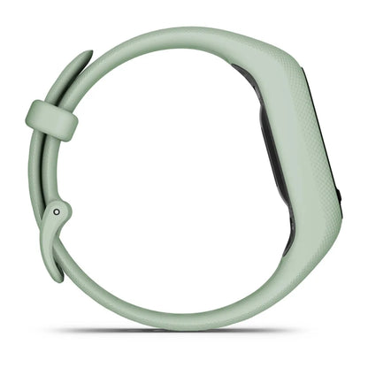 Side view of a Garmin vivosmart 5 fitness tracker in a light green color.