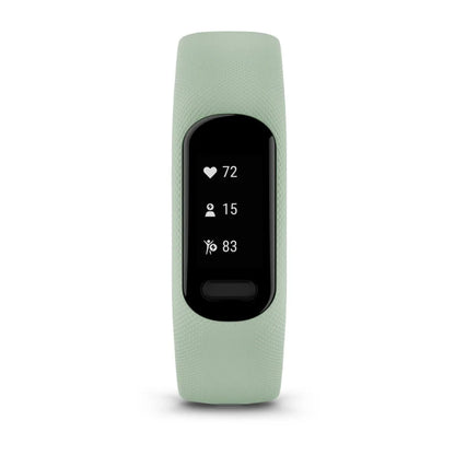 Garmin vivosmart 5 fitness tracker displaying heart rate, steps, and calories burned on a sleek black screen with a light green band.