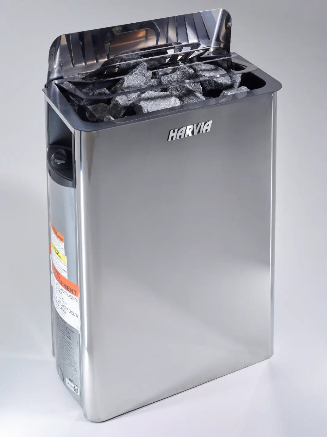 Harvia stainless steel sauna heater with rocks and chrome guard on top.