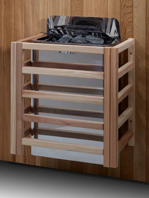 Wooden-framed sauna stove with stone rocks and slatted sides.
