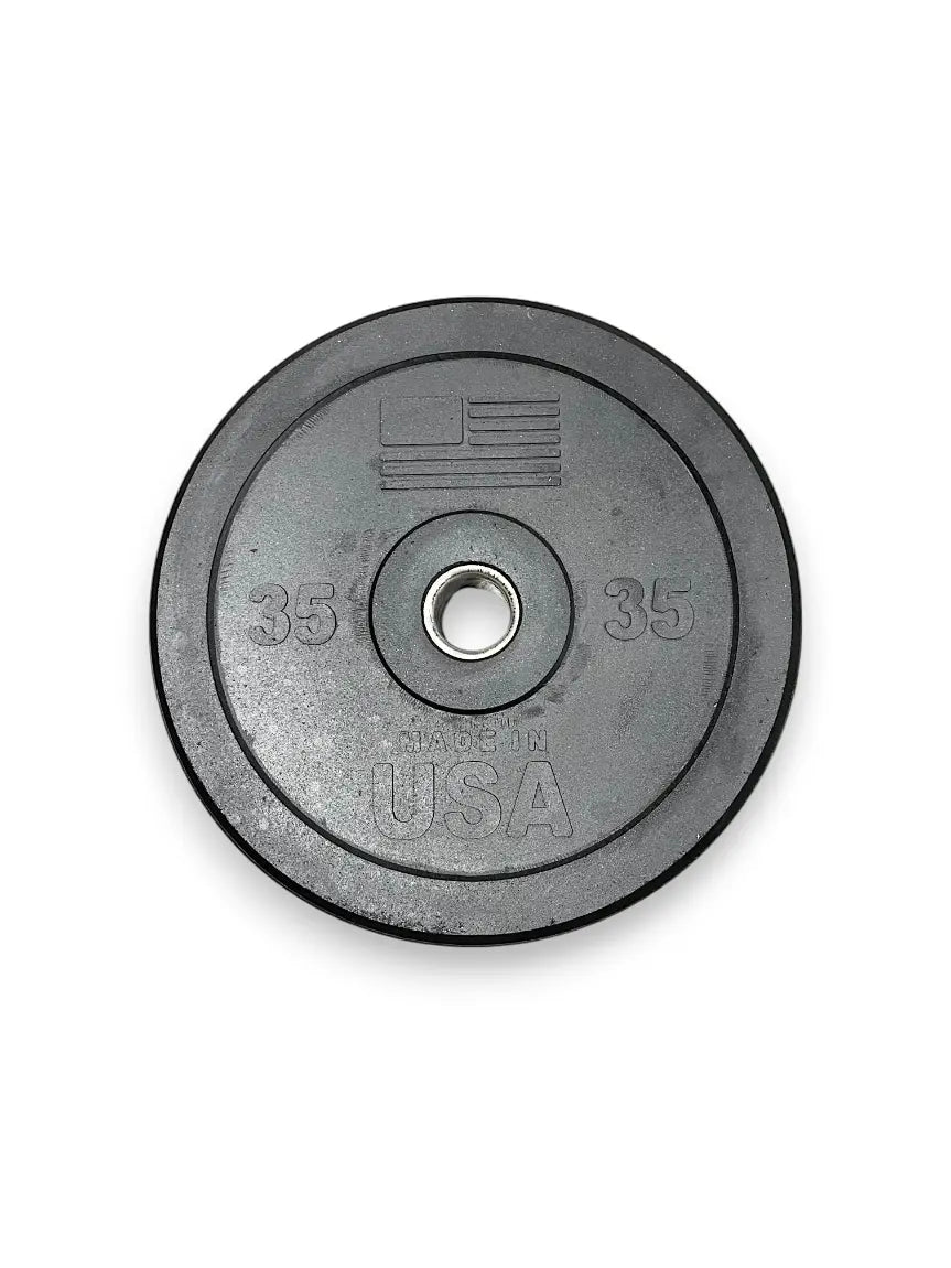 Gray rubber bumper plate with 35-pound weight markings on both sides, metal center collar, and USA text embossed on the face.
