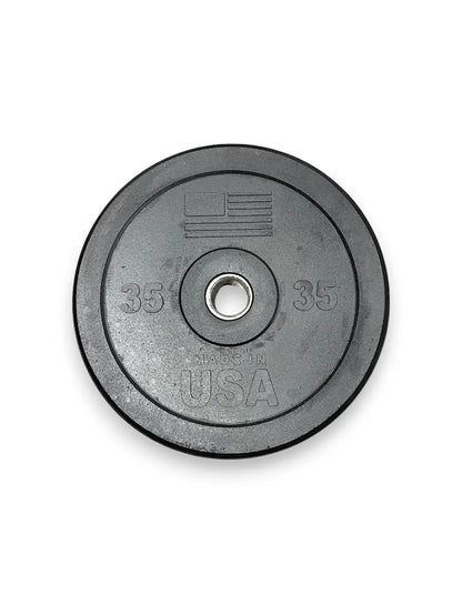 Gray rubber bumper plate with 35-pound weight markings on both sides, metal center collar, and USA text embossed on the face.