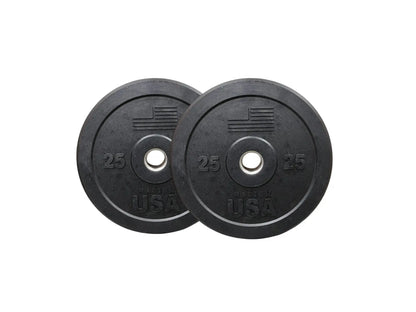 Pair of black rubber bumper plates marked 25 pounds each with central steel hubs and USA text embossed on the surface.