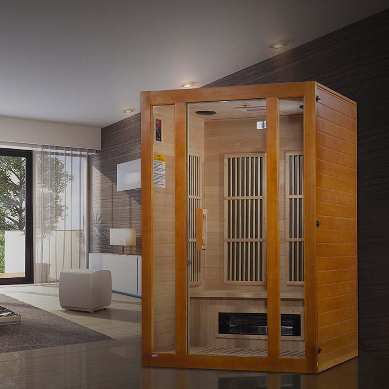 Maxxus Aspen Dual Tech 2 Person Far Infrared Sauna displayed in a modern living room setting with natural light and contemporary decor.
