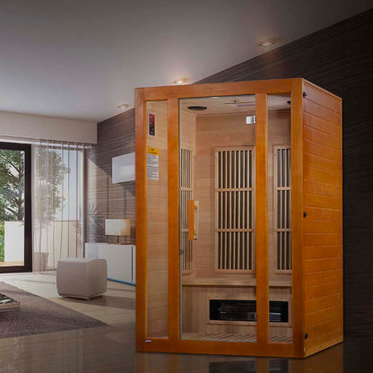 Maxxus Aspen Dual Tech 2 Person Far Infrared Sauna displayed in a modern living room setting with natural light and contemporary decor.