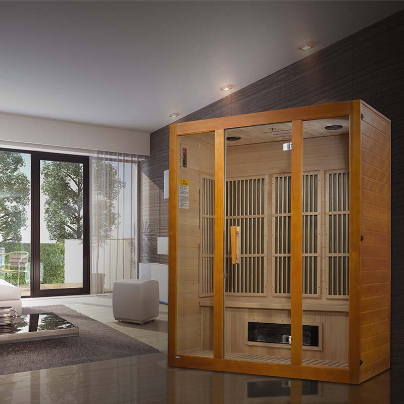 Maxxus Alpine Dual Tech 3 Person Far Infrared Sauna in a modern living room setting with large windows and contemporary decor.