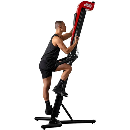 VersaClimber TS Magnetic – man climbing on red machine demonstrating high-intensity full-body cardio workout