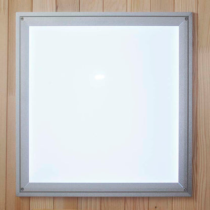 Maxxus MX-K306-01 Far Infrared Sauna control panel featuring a sleek, illuminated design against a wooden background.