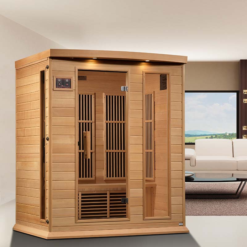 Maxxus MX-K306-01 Far Infrared Sauna displayed in a modern interior setting with a large window and contemporary furniture.