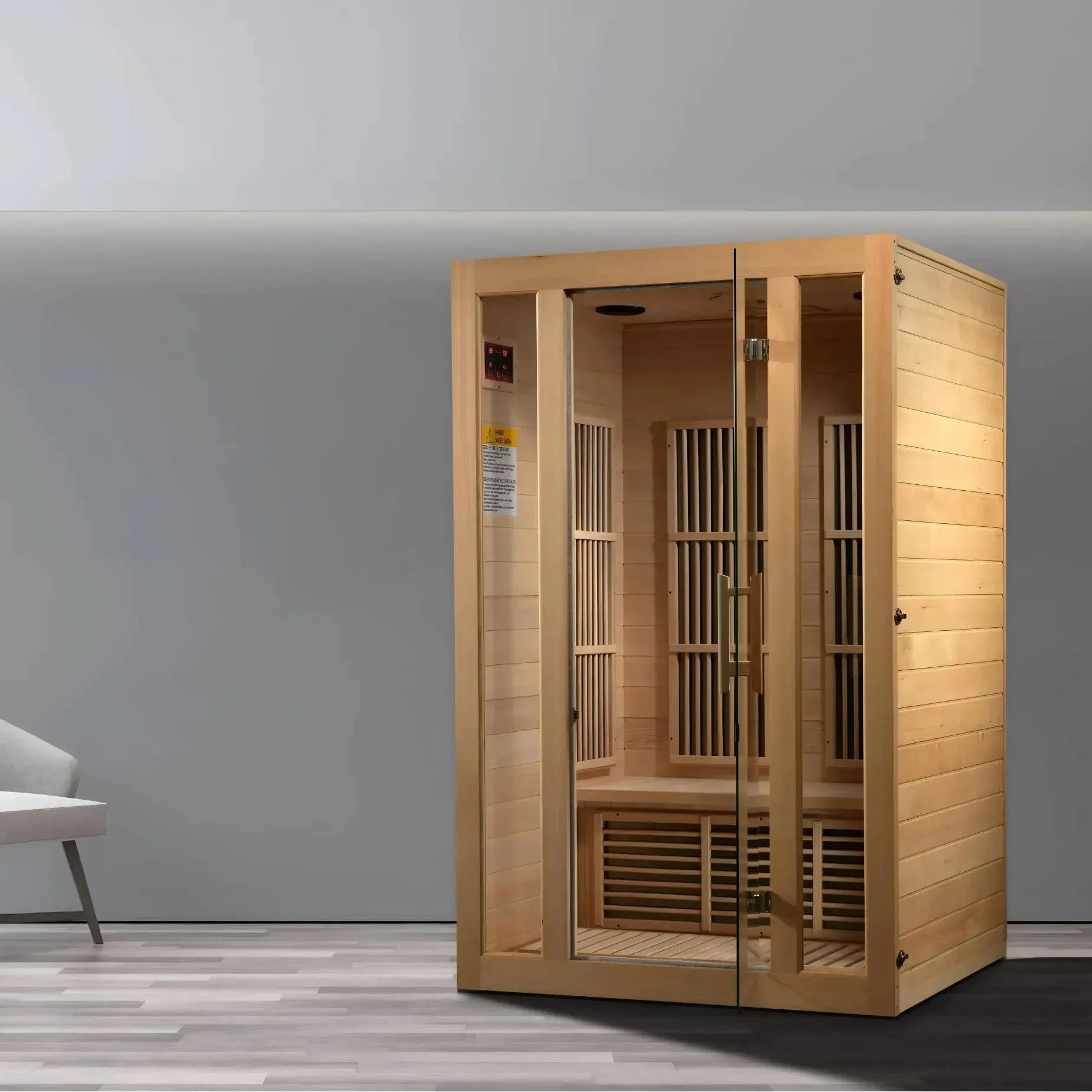 Maxxus Seattle 2 Person Far Infrared Sauna displayed in a modern interior setting with light wood paneling and a sleek design.