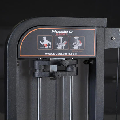 Muscle D Classic V2 selectorized abdominal crunch machine with dark gray frame and instruction diagrams on the control panel showing exercise positions.