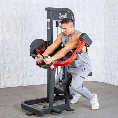 Man performing a biceps and triceps exercise on a black and red selectorized combo machine with weight plate storage.