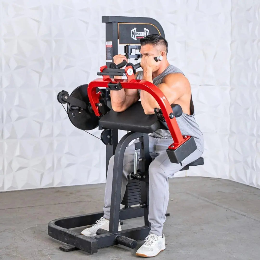 Man performing biceps and triceps curls on a red and black selectorized combo machine with padded arm supports and weight stack.