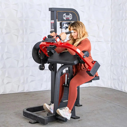 Woman performing biceps and triceps exercises on a red and black selectorized combo machine with dual handles and adjustable seat.