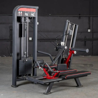 Commercial glute kick machine with gray frame, red and black padded seat and leg platform, cable pulley system on left side, and instruction icons on top panel.