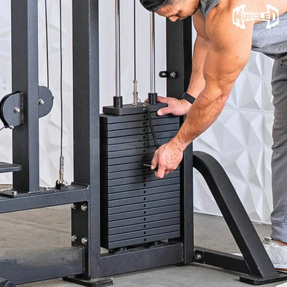 Man adjusting the weight pin on a black selectorized lat pulldown and low row combo machine with stacked weight plates in a gym setting.