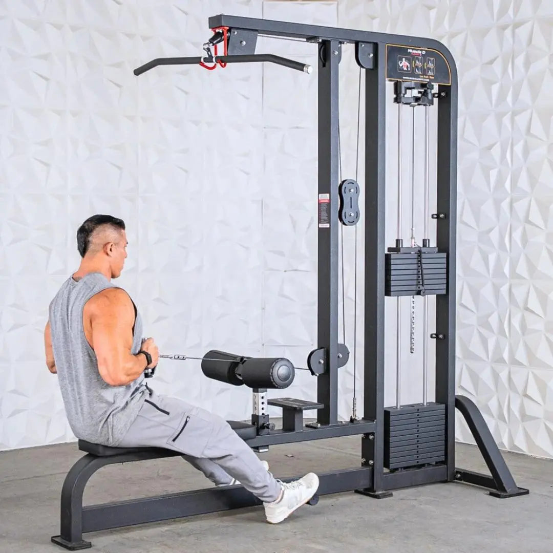 Man performing a seated row exercise on a black selectorized lat pulldown and low row combo machine with weight stack and cable attachment.